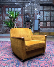Load image into Gallery viewer, Rolling Orange Mid-Century Armchair
