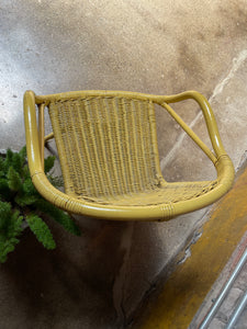 Swiveling Yellow Wicker Chair